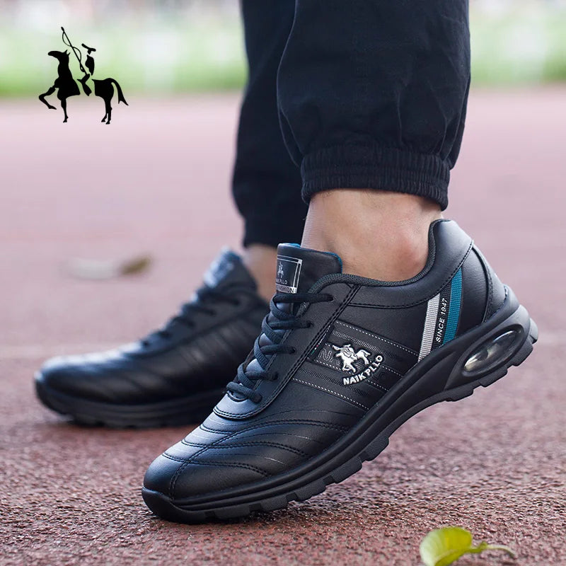 Black sneakers worn outdoors, featuring a breathable design and stylish finish.