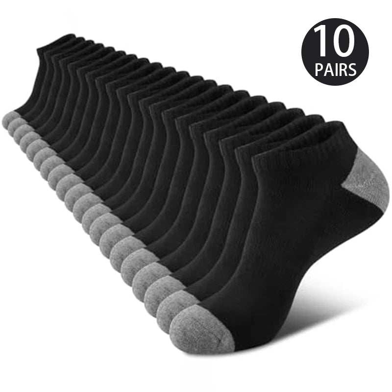 A stack of 10 pairs of black sports socks, displayed neatly.