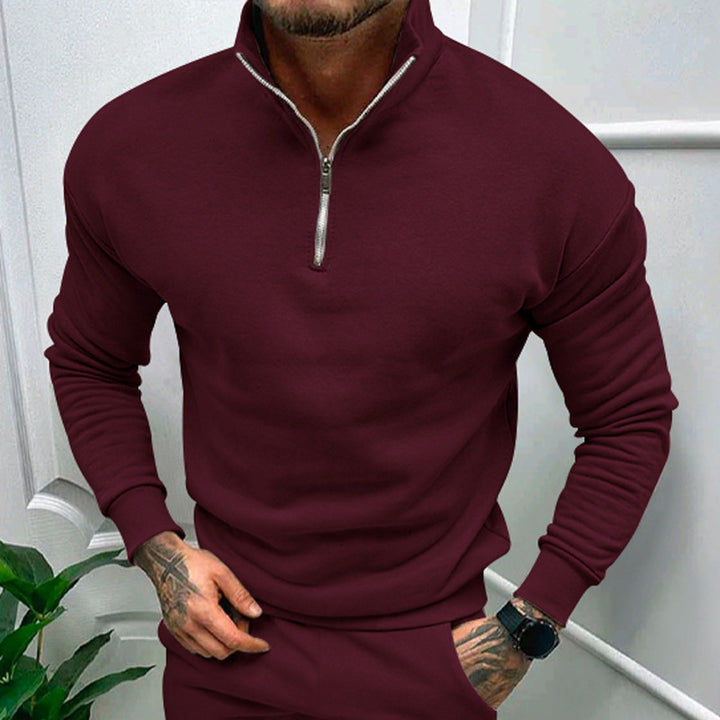 Elegant burgundy quarter-zip pullover with a rich hue, perfect for adding a touch of luxury to your wardrobe.