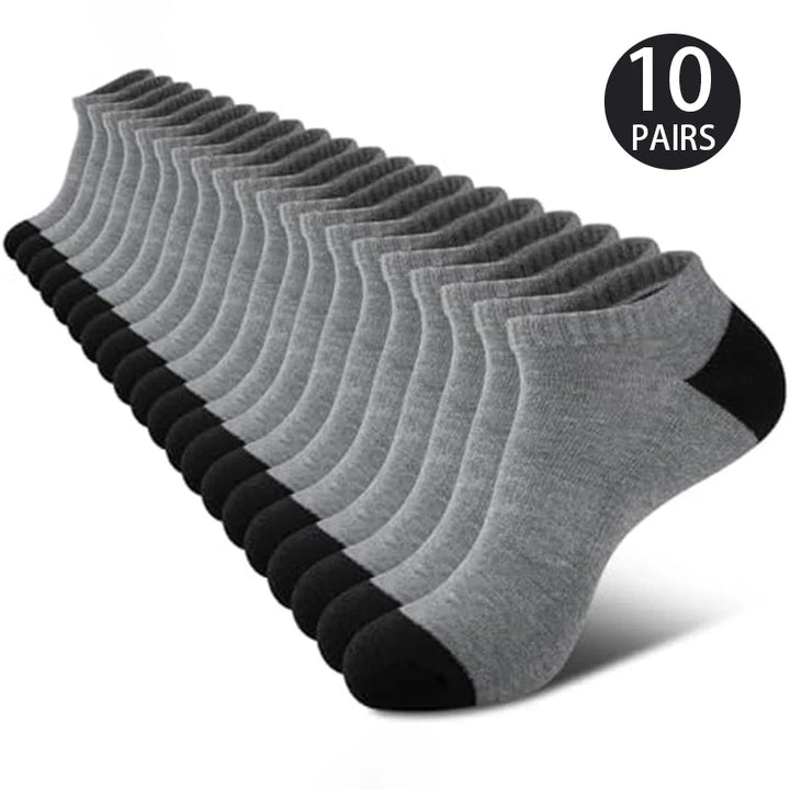 A stack of 10 pairs of grey sports socks, displayed neatly.
