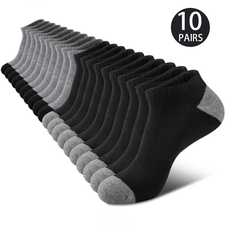  A stack of grey and black cushioned sports socks.