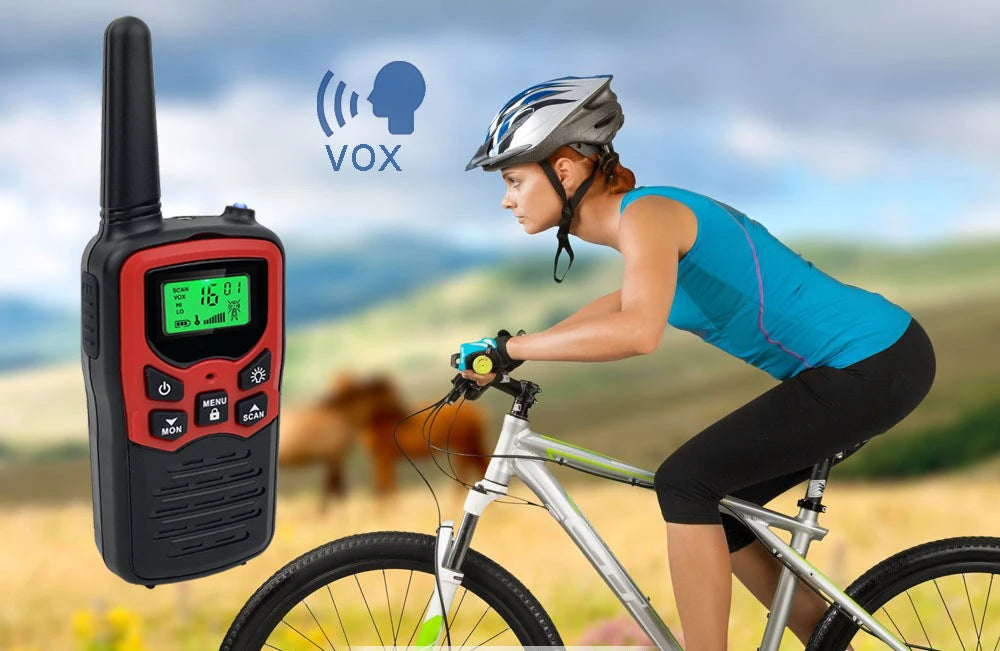 Woman riding a bike with a walkie-talkie and 'VOX' symbol in the background