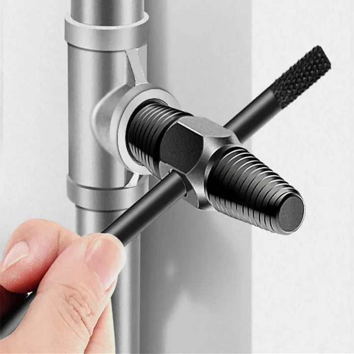 Hand holding a tool to adjust a faucet handle on a white background