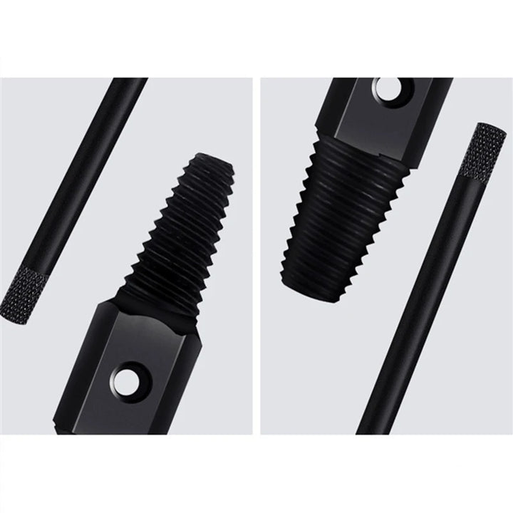 Close-up of black metal screws on a light gray background
