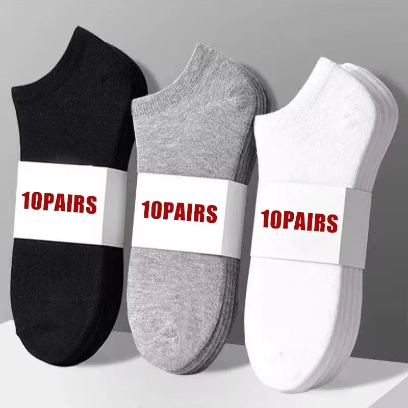 Set of 10 men's no-show socks in black, grey, and white, packaged for sale.