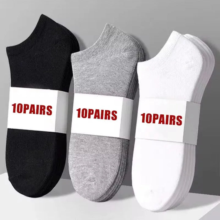 Set of 10 men's no-show socks in black, grey, and white, packaged for sale.