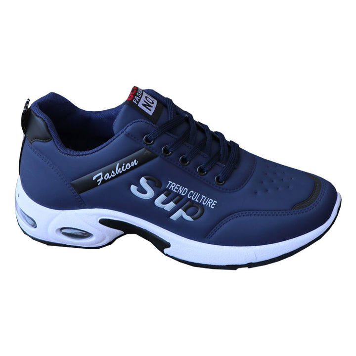 Profile shot of the navy blue sports sneakers with lace-up closure and fashion design.