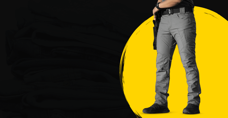 Person wearing gray pants on a yellow and black background