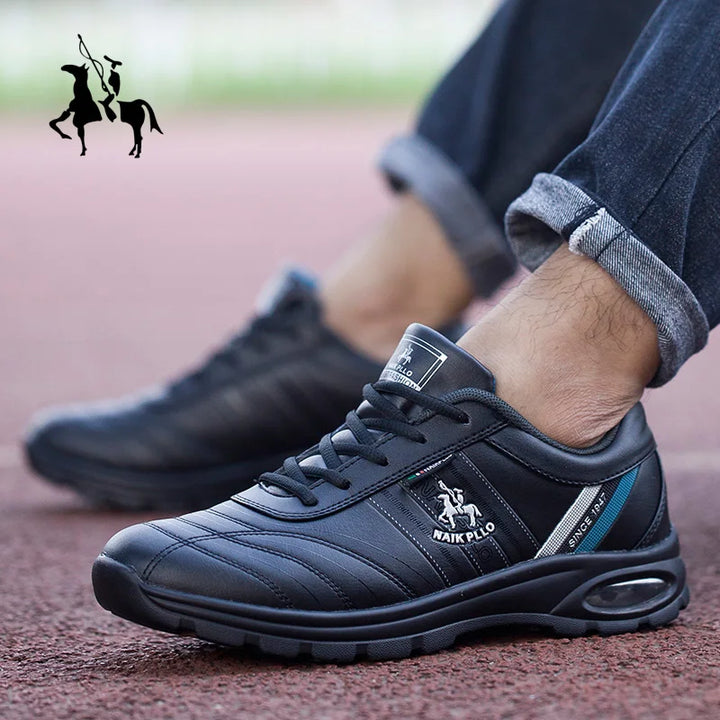  A pair of navy blue sneakers with an air-cushion sole, highlighting their comfort and support.