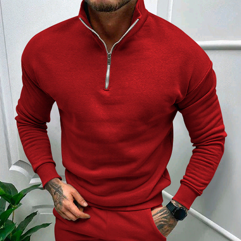 Vibrant red quarter-zip pullover with ribbed detailing, ideal for making a bold fashion statement.