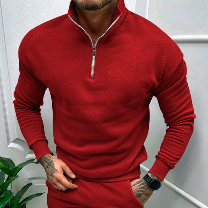 Vibrant red quarter-zip pullover with ribbed detailing, ideal for making a bold fashion statement.