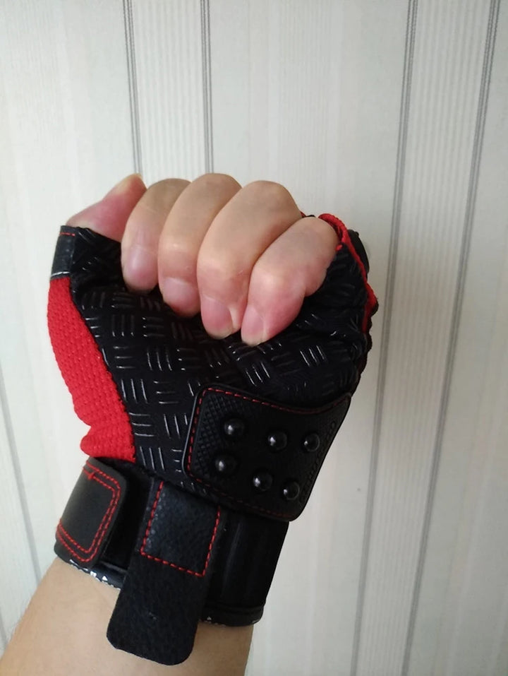 Black and red glove on a hand against a white paneled wall
