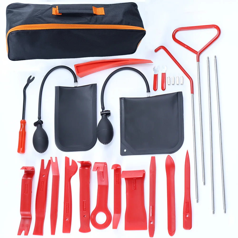 Set of car repair tools with a black and orange carrying bag on a white background