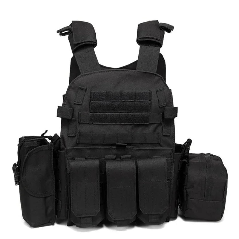 Black tactical vest with multiple pouches on a white background