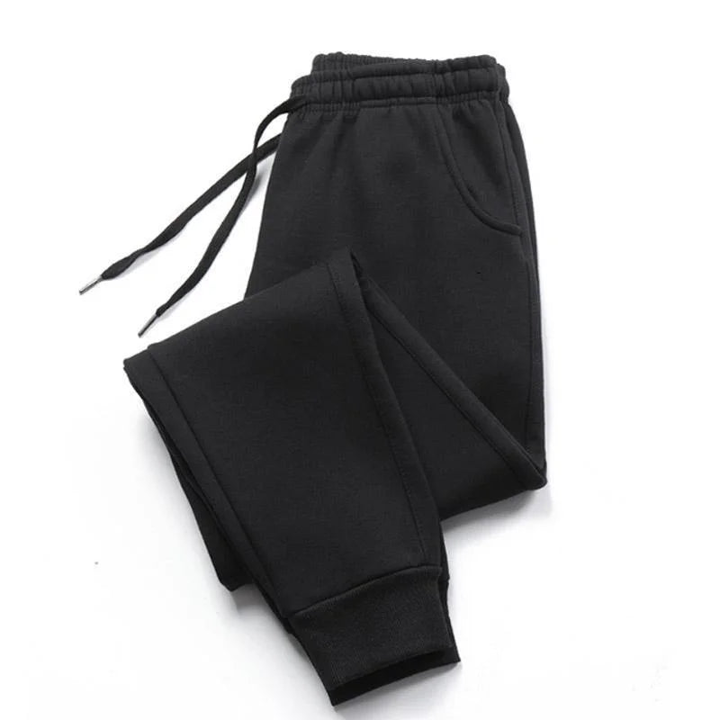 Stretchy athletic pants styled with running shoes