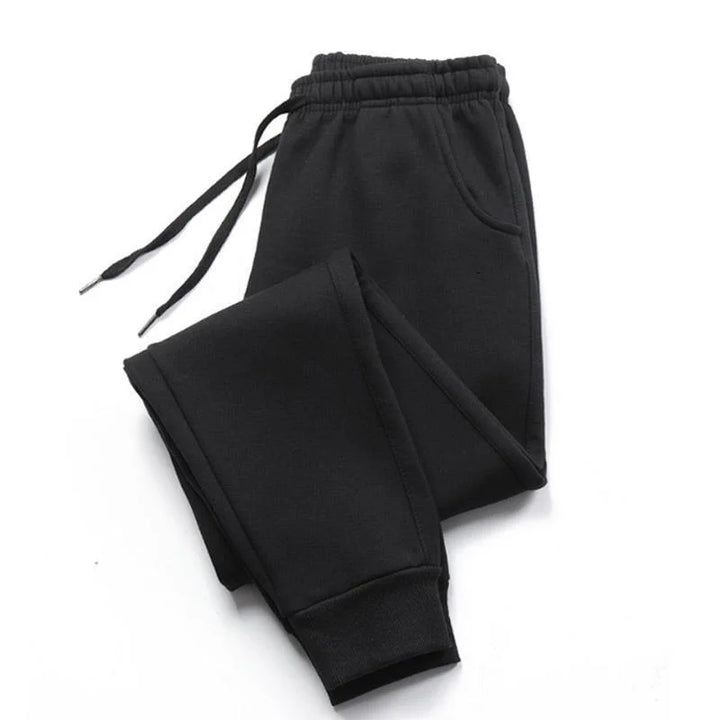 Stretchy athletic pants styled with running shoes