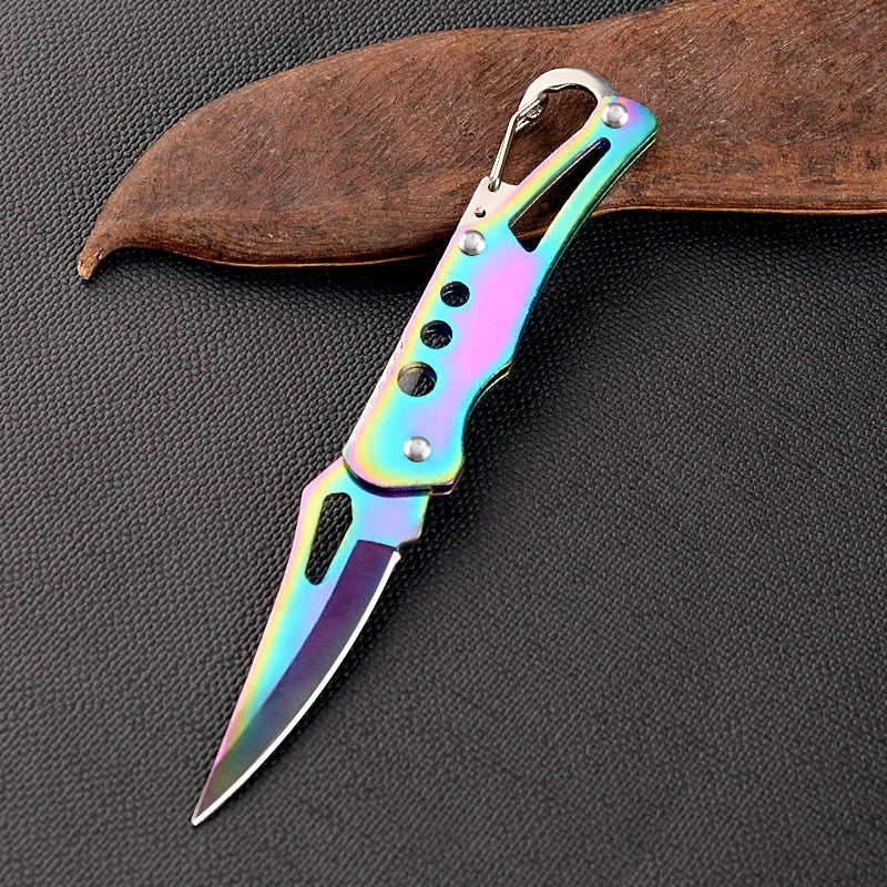 Multicolored pocket knife on a dark textured surface