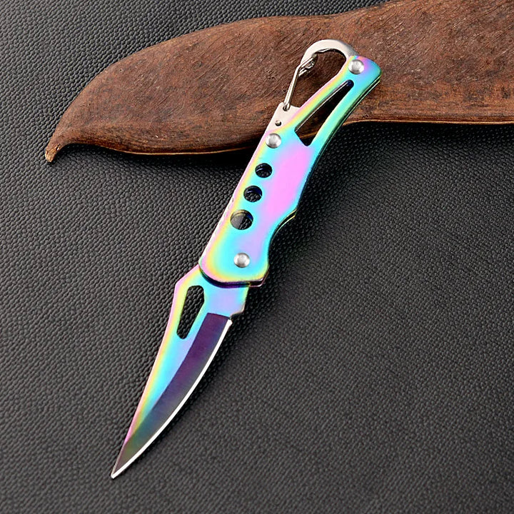 Multicolored pocket knife on a dark textured surface