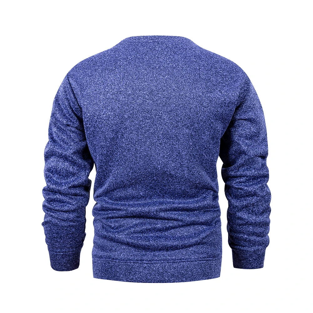 Blue textured sweater on a white background