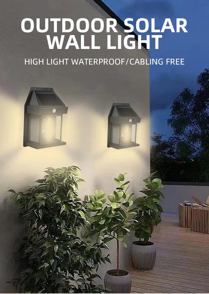 LED solar wall light illuminating driveway at night
