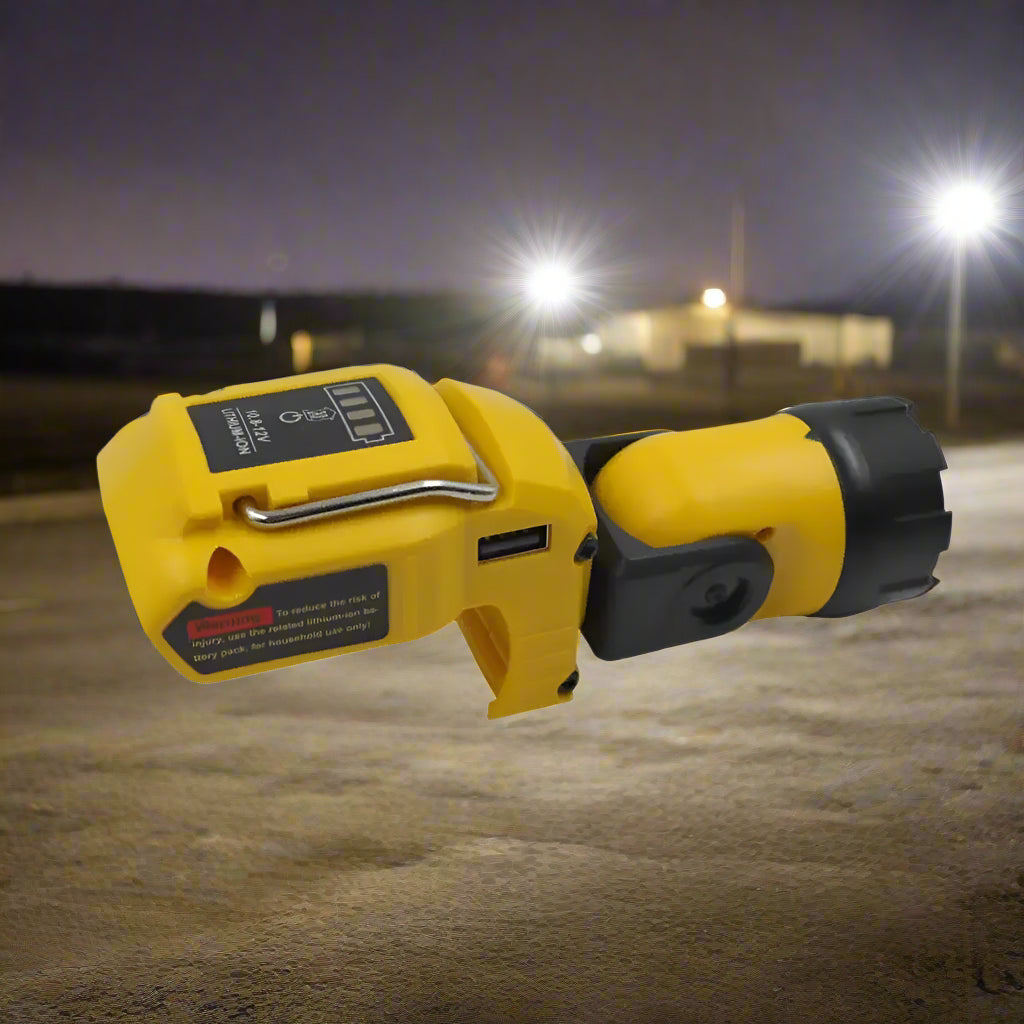 Side view of flashlight adapter with visible rotation head in an outdoor nighttime construction site