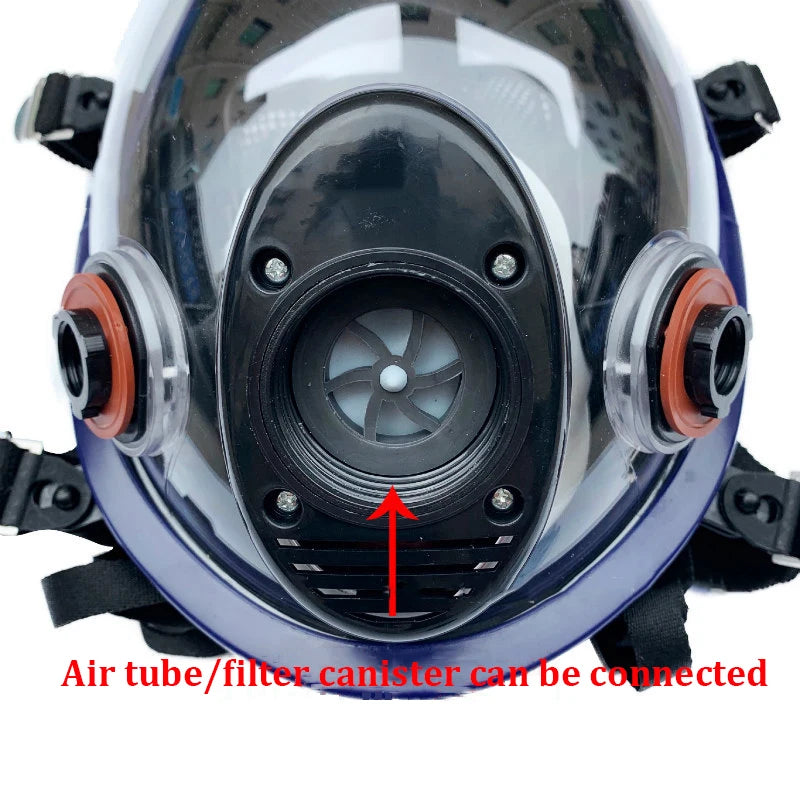 Close-up of a diving mask with an air tube/filter canister connection point, on a white background.
