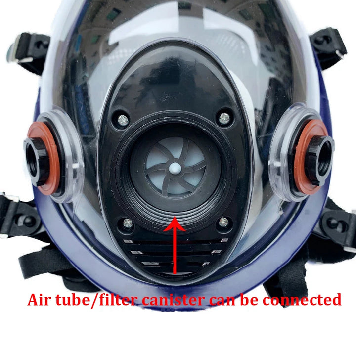 Close-up of a diving mask with an air tube/filter canister connection point, on a white background.