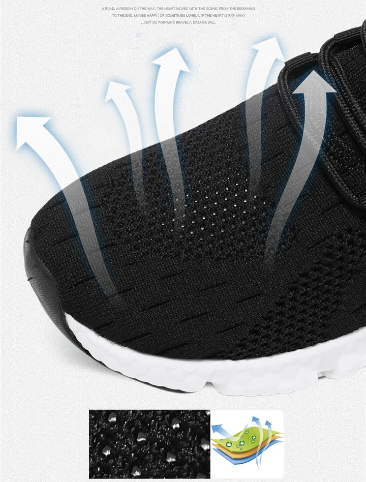 Sneakers in hand showing lightweight construction