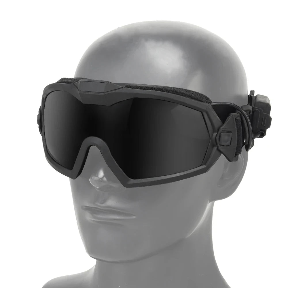Black goggles on a mannequin head against a white background