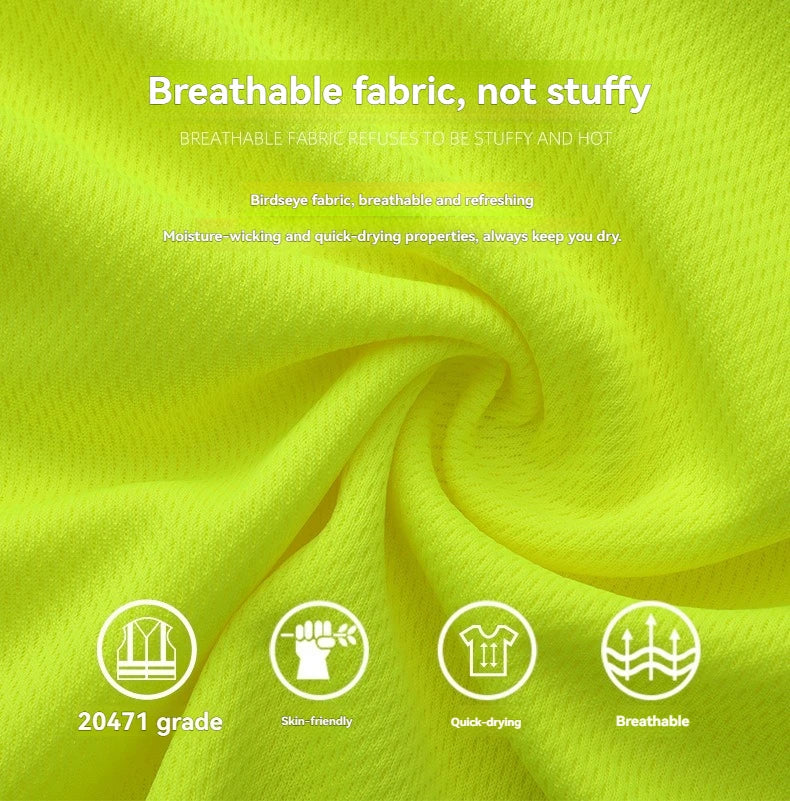 Close-up of bright yellow fabric with text and icons highlighting fabric properties.