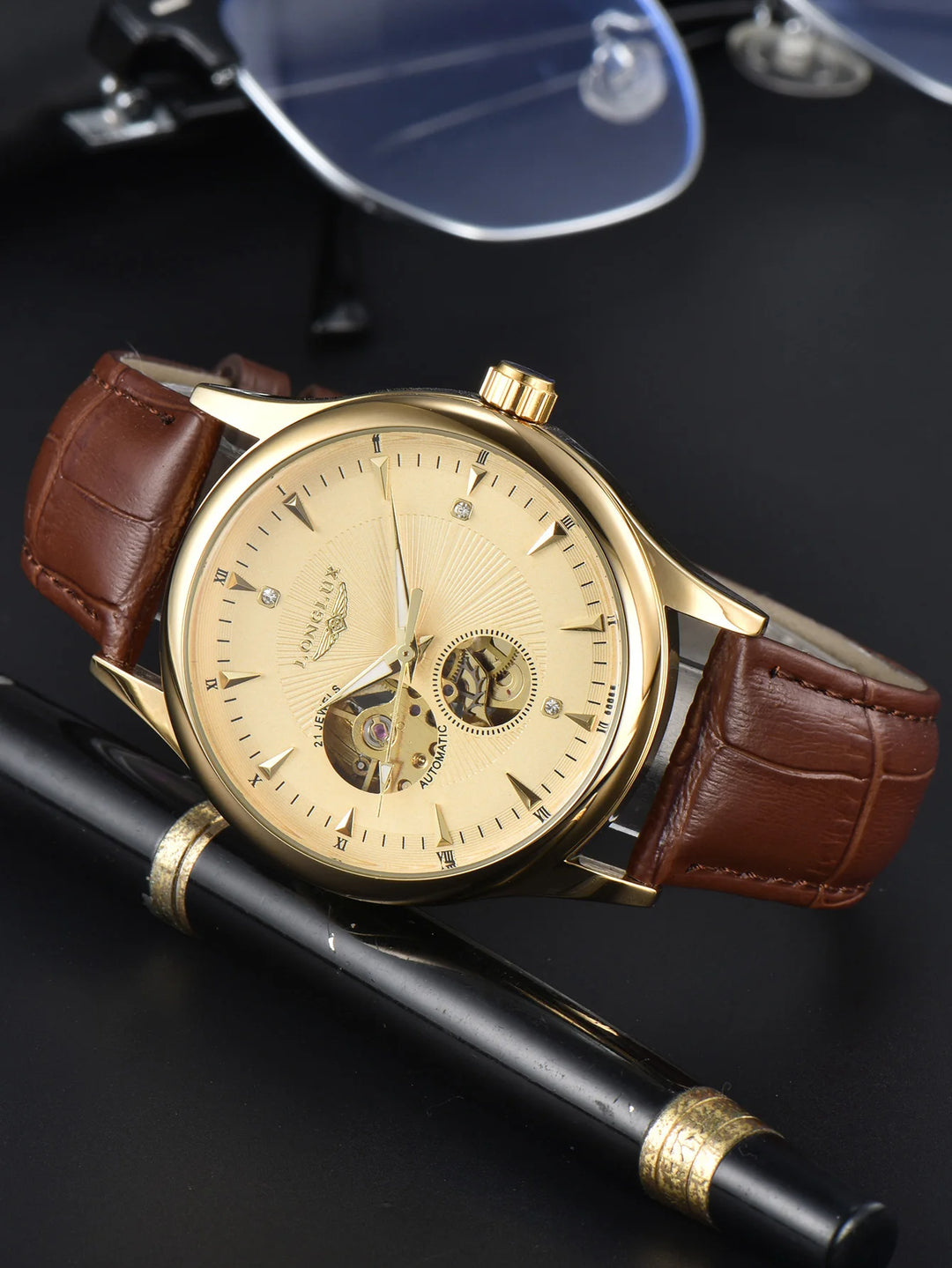 Front view showing dial detail and polished silver casing