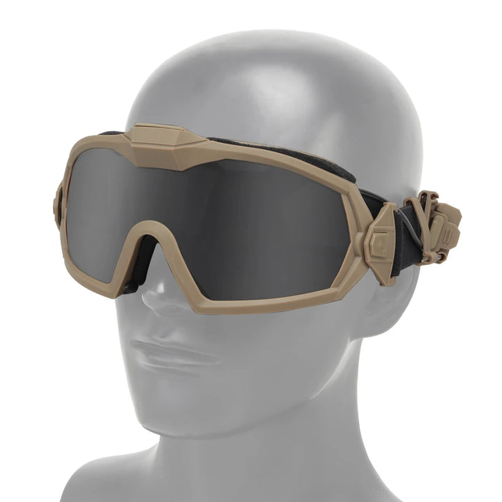 Tan goggles on a mannequin head against a white background
