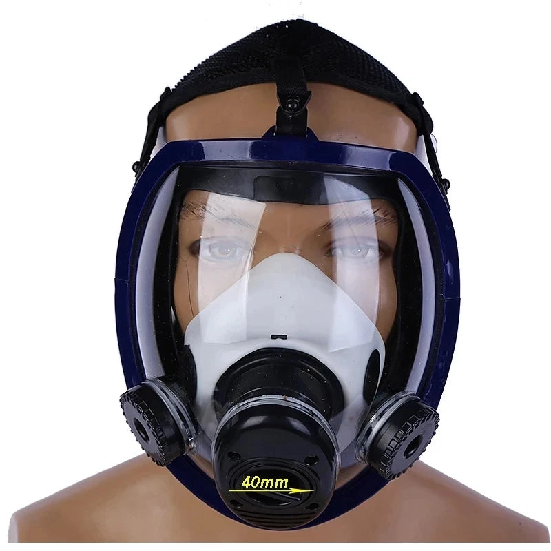 Full-face respirator mask with clear visor on a mannequin head against a white background
