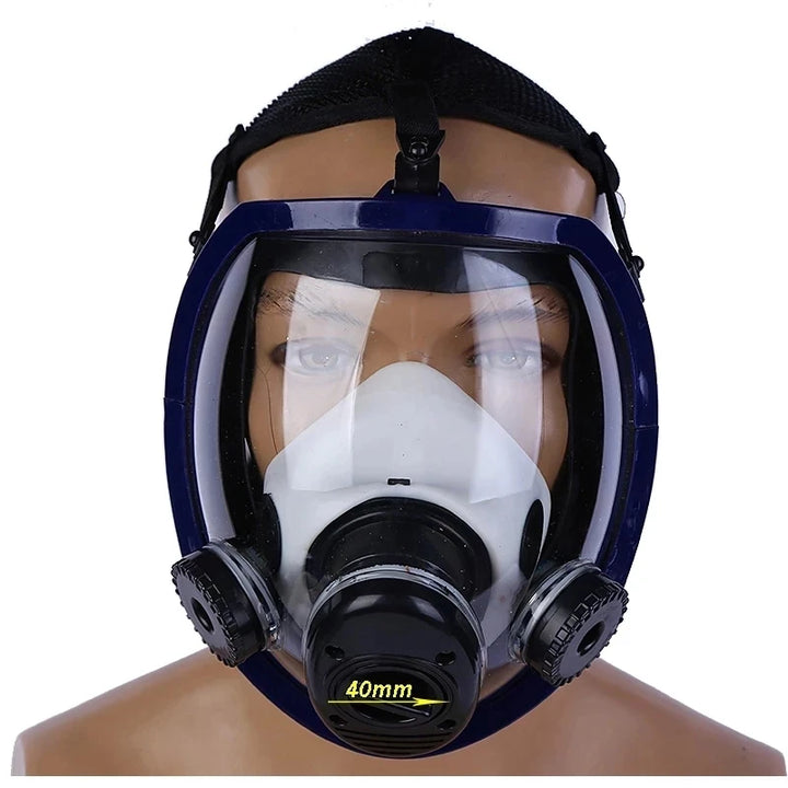 Full-face respirator mask with clear visor on a mannequin head against a white background