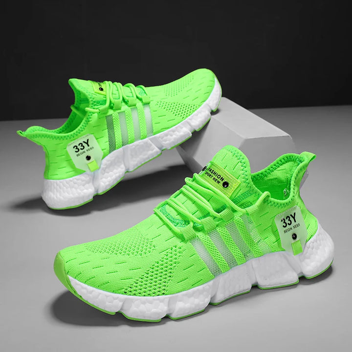 Shoes displayed inside open branded shoebox