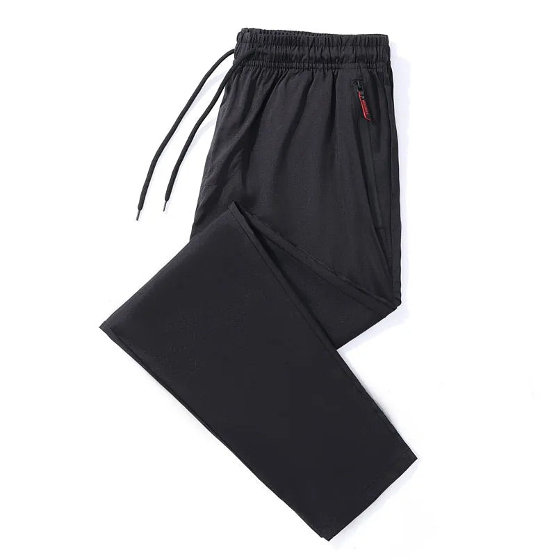 Black pants with a red label on a white background