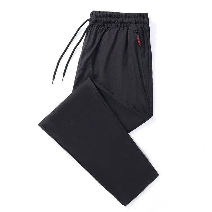 Black pants with a red label on a white background