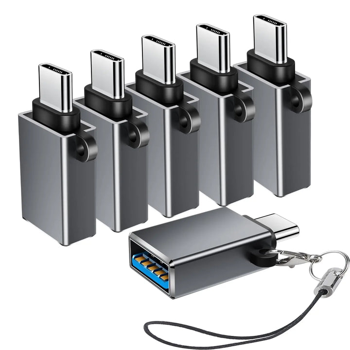 Set of USB Type-C connectors with a keychain and lanyard on a white background