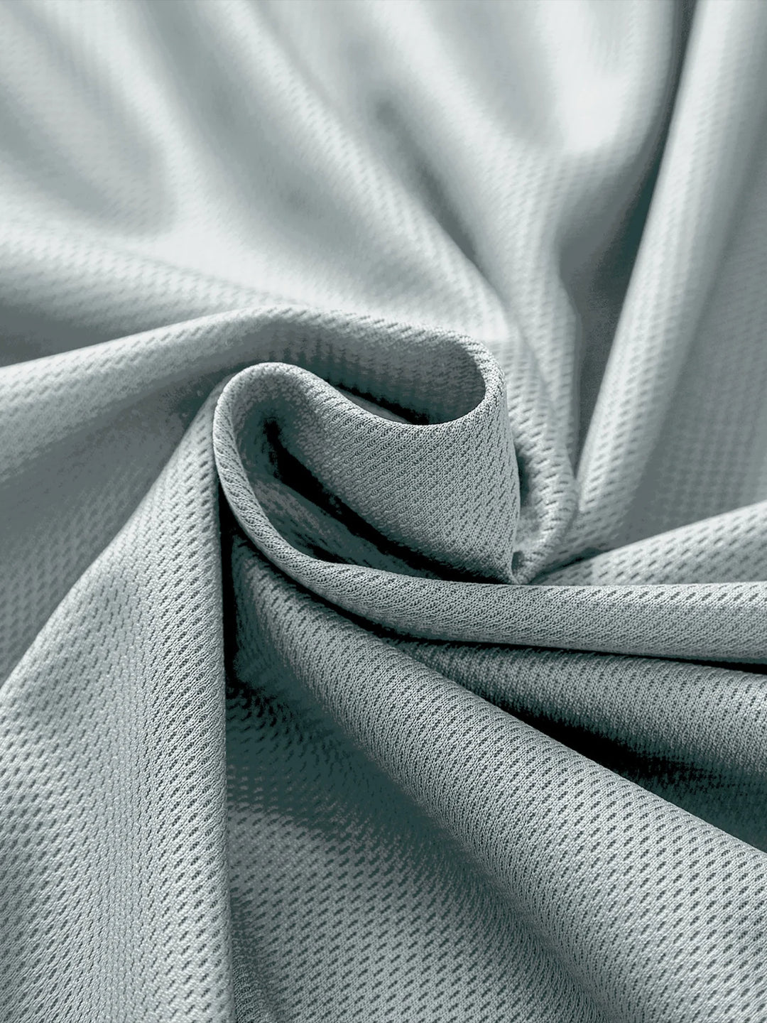 Close-up of textured light gray fabric