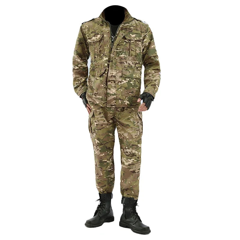 Camouflage military jumpsuit with gloves and boots on a white background