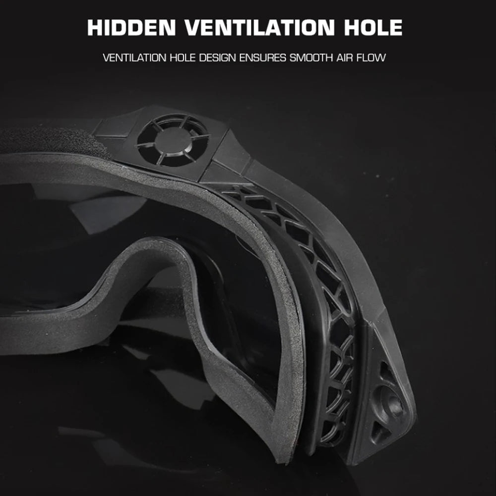 Close-up of a black mechanical component with a hidden ventilation hole on a dark background.