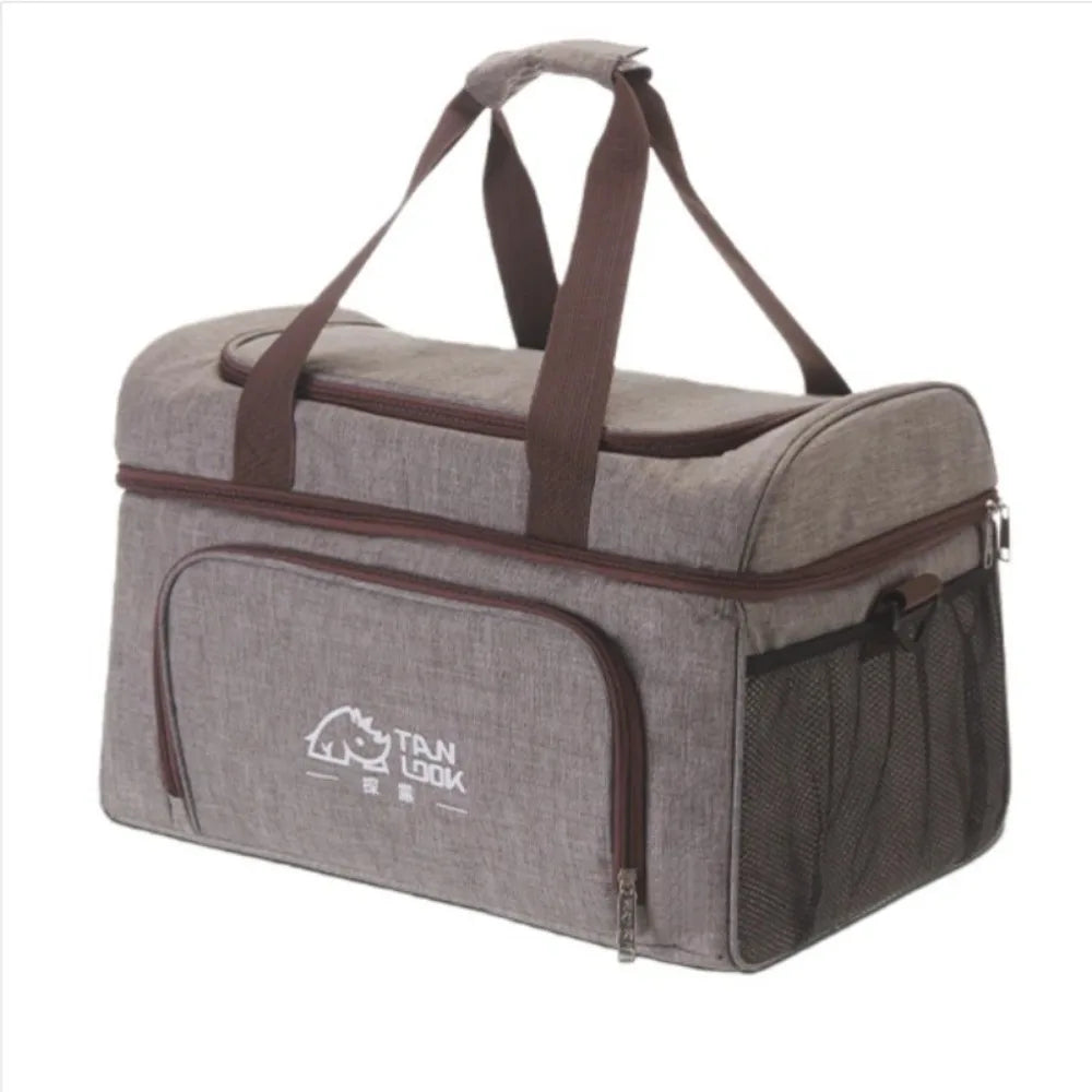 Gray pet carrier / cooler with brown straps on a white background