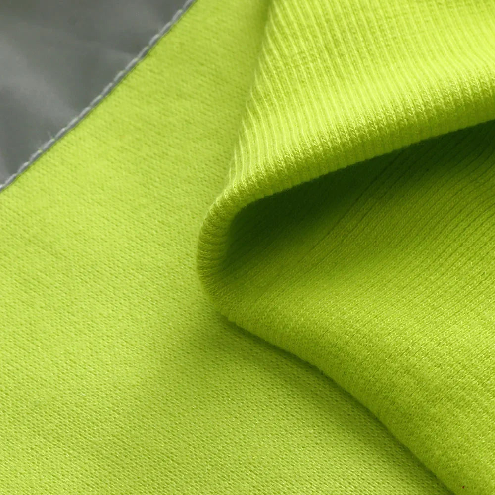 Close-up of green fabric with a textured surface