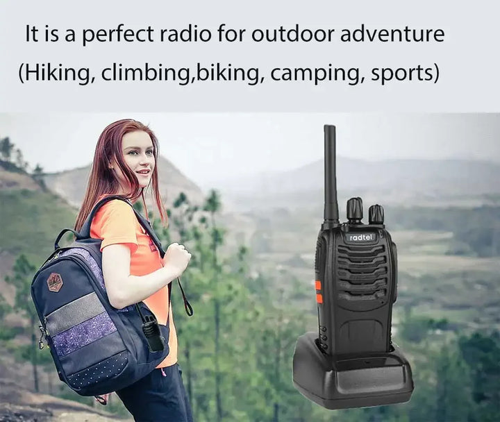 Woman with a backpack and a walkie-talkie against an outdoor background