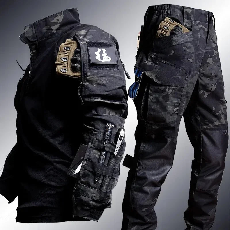 Tactical gear including a jacket and pants with various pockets and attachments on a gray background.