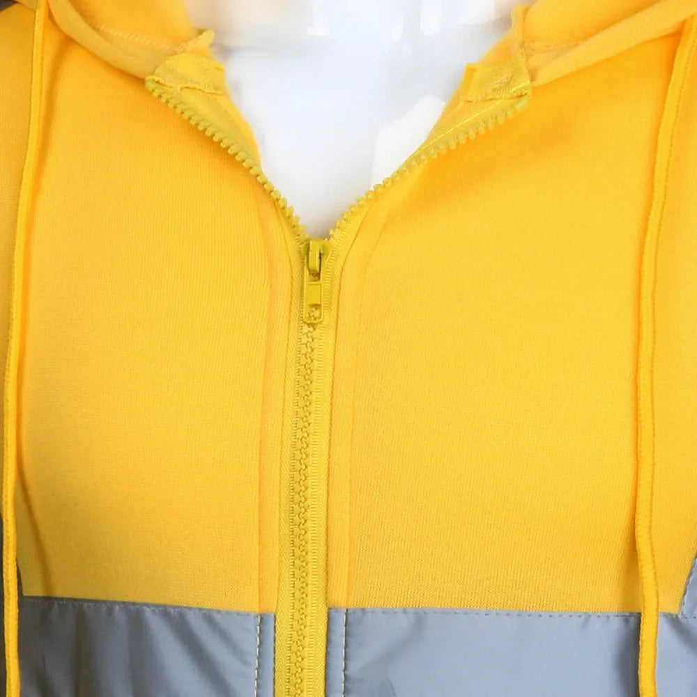 Close-up of a yellow and gray jacket with a zipper