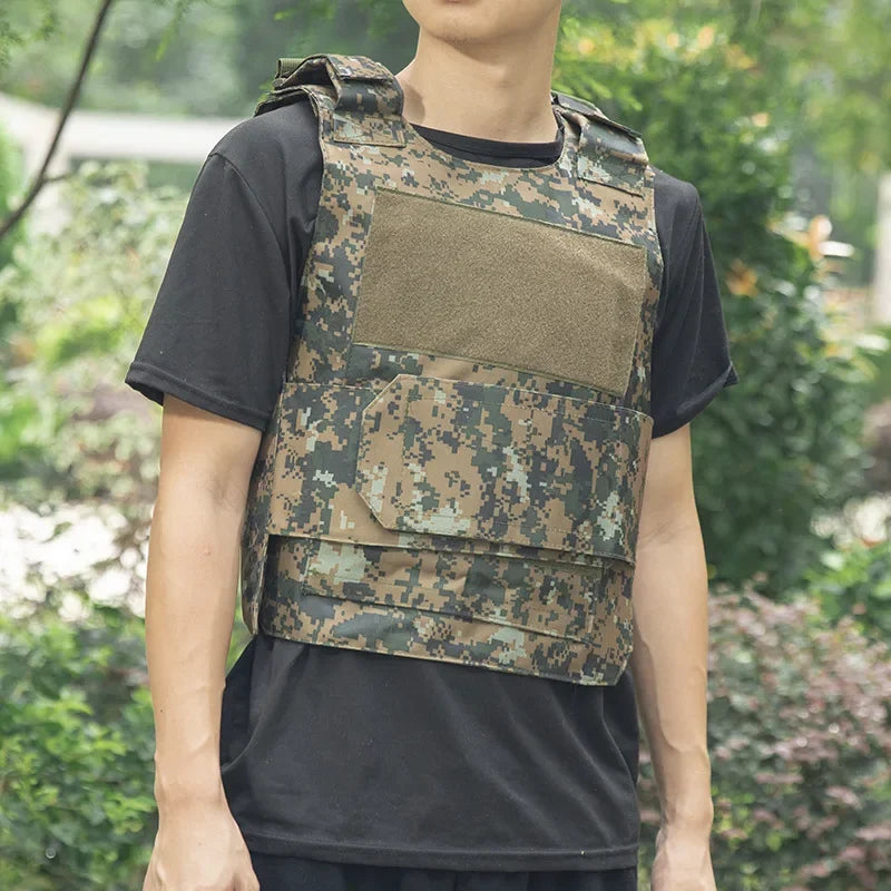Person wearing a camouflage tactical vest outdoors with greenery in the background