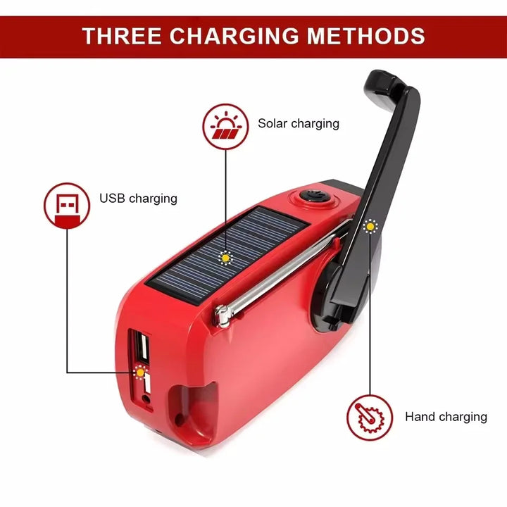 Red portable device with solar panel, USB port, and hand crank for charging, labeled 'Three Charging Methods'.
