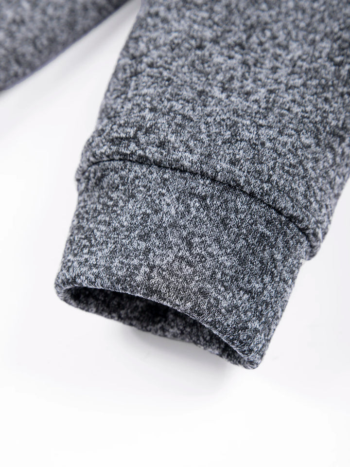 Close-up of a gray textured fabric on a white background