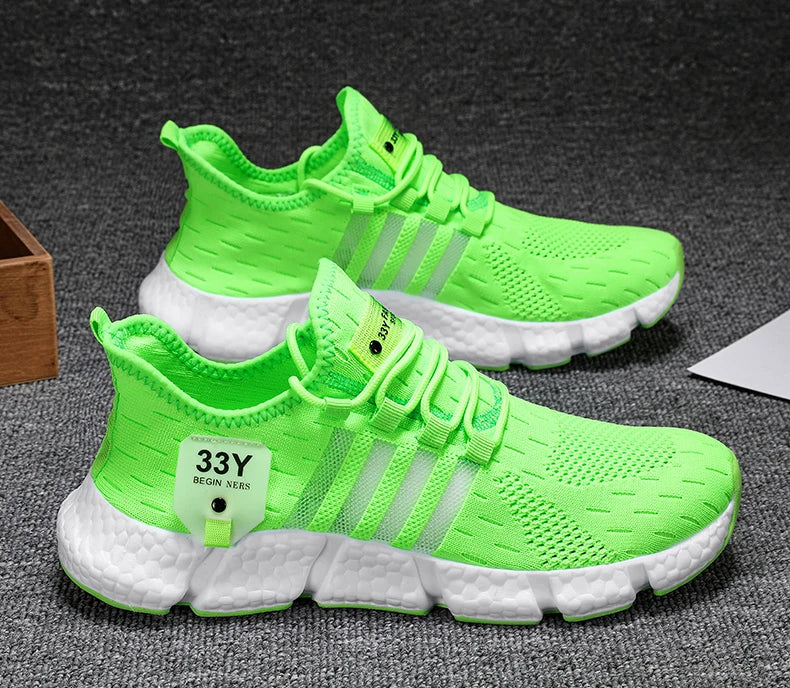 Sneakers showcased beside headphones and fitness watch